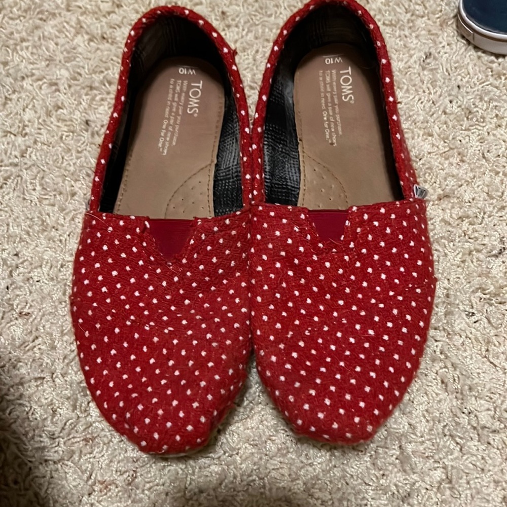 Gently used red and white polka dot Toms